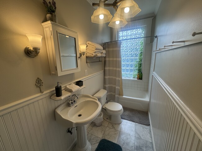 Bathroom with shower and tub. - 339 Whitaker St