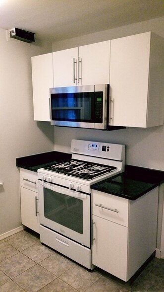 Gas range with stone counters - 522 N 15th St