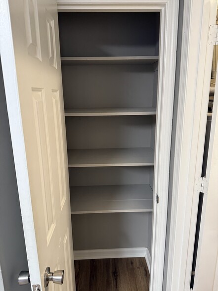 Pantry with shelves in kitchen - 8623 Leatherwood Trl