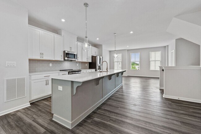 Building Photo - BRAND NEW Townhome located in Westside Ben...