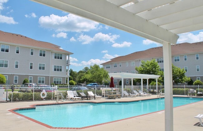Building Photo - 2 Bedroom Condo w/Open Floor-Plan & Stainless Steel Appliances! Some Utilities Included!