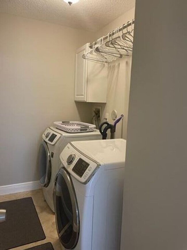 Building Photo - 7891 Manor Forest Blvd