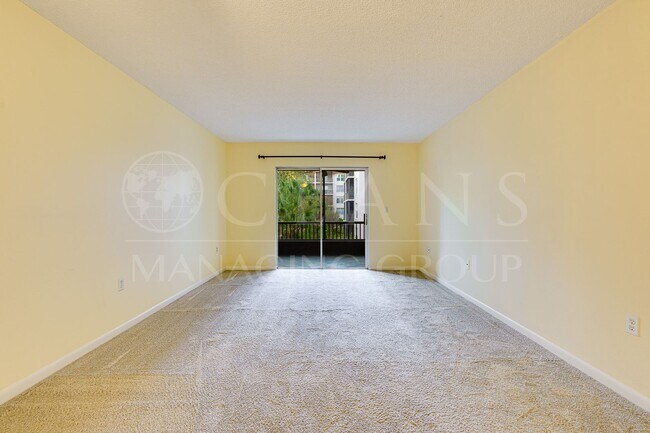 Building Photo - Spacious Condo with utilities included! Lo...