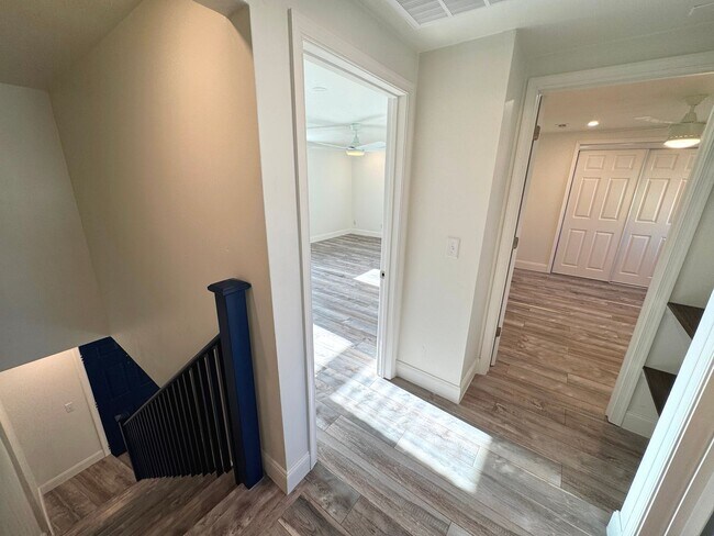 Building Photo - RENOVATED 3 bedroom end unit across the street from the Beach!