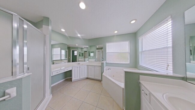 Building Photo - Spacious 6-Bedroom Pool Home with Open Floor Plan & Private Master Suite