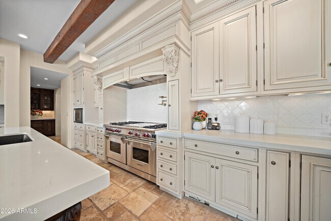 Building Photo - 9290 E Thompson Peak Pkwy