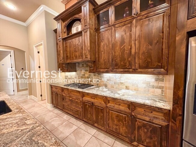 Building Photo - Welcome to this elegant 4-bedroom, 5-bathroom home in desirable Hurricane Lake Estates with Pool ...
