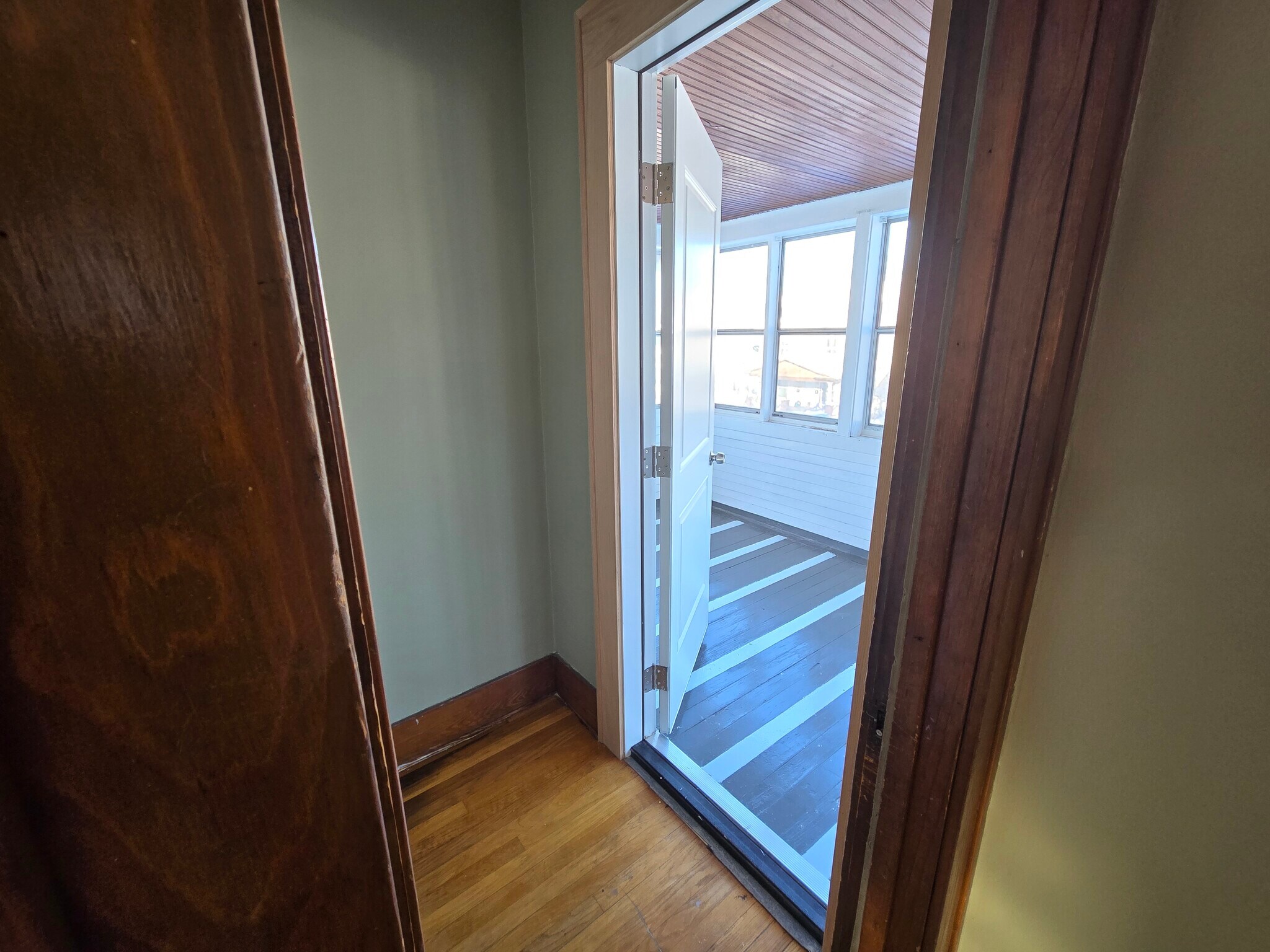 door to 3 seasons porch - 1019 Widdicomb Ave NW