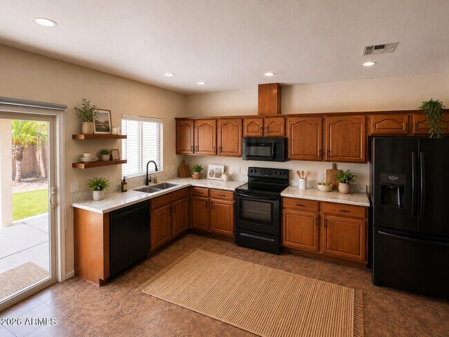 Building Photo - 8773 W Dahlia Dr