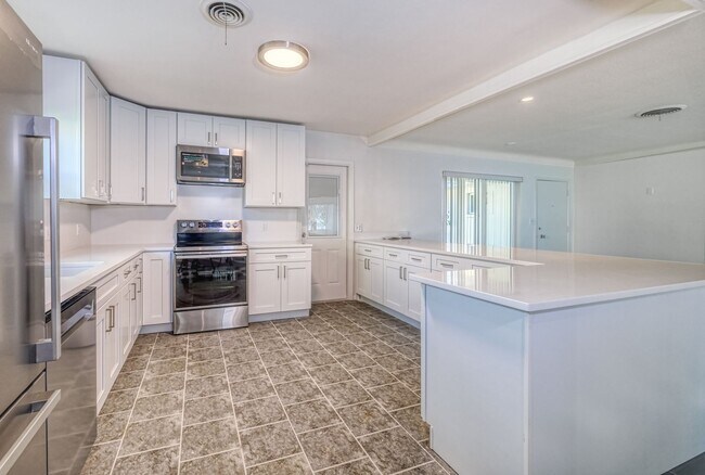 Building Photo - THIS SIZEABLE 4 BEDROOM, 3 ½ BATH, 2482 SQFT RESIDENCE IS READY FOR A LONG TERM RENTER.