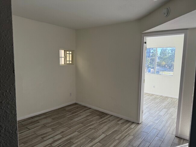 Living room from kitchen - 118 W Santa Fe Ave