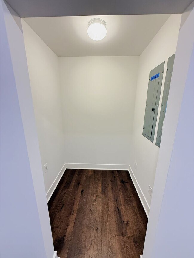 Building Photo - Brand new 4 level, 4 Bedroom Townhome with Elevator!