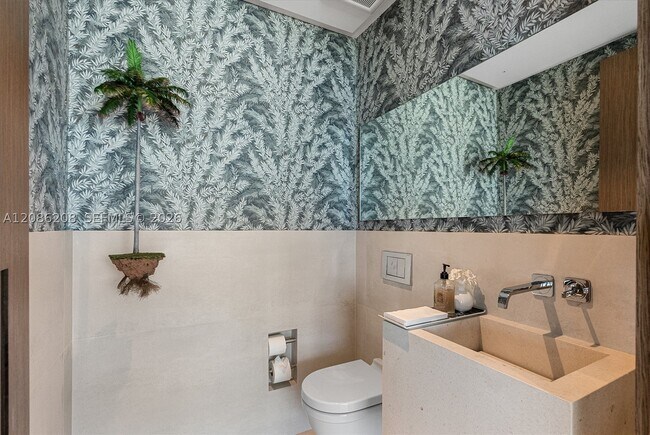 Building Photo - 10203 Collins Ave