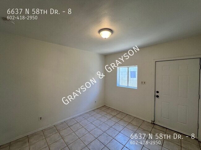 Building Photo - 6637 N 58th Dr