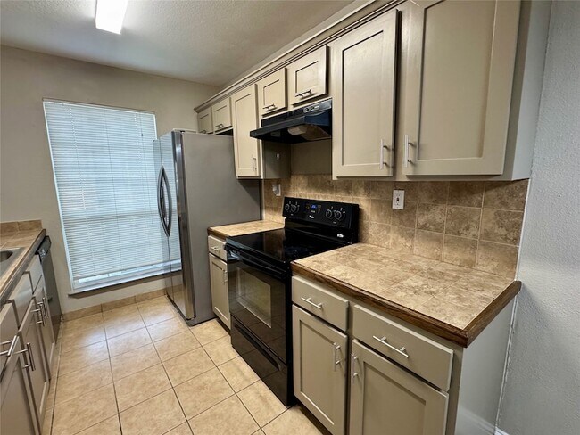 Building Photo - 5981 Arapaho Rd