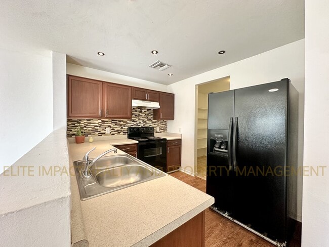 Building Photo - 5210 E Desert Straw Ln