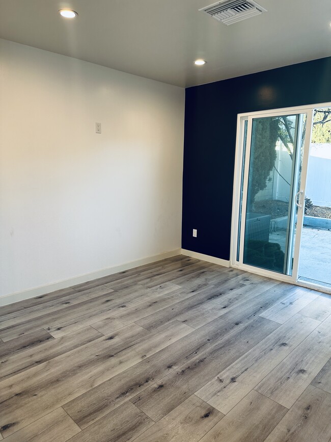 Living Room & Accent Wall - 10201 Eton Ave