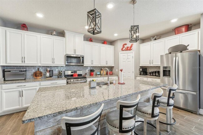 Building Photo - 6028 Milestone Dr
