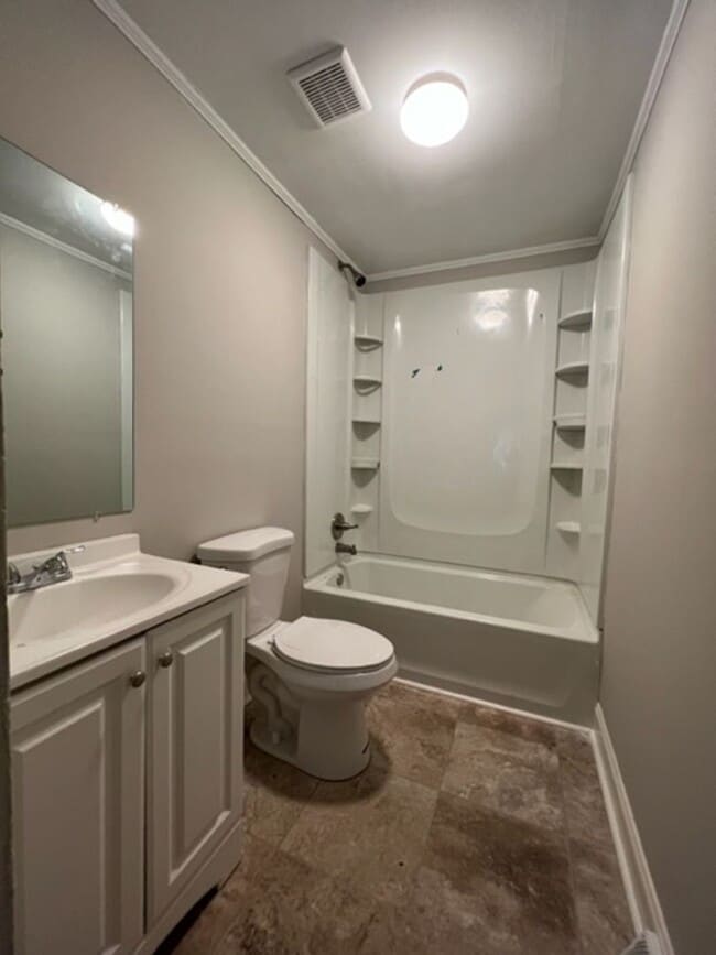 Building Photo - Low Maintenance & Very Affordable Living, Updated 1-BD, 1-BA duplex located in a convenient area ...