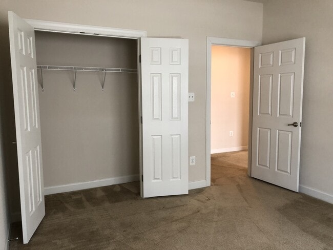 Building Photo - 2 Level Townhouse/condo with one car garage in the Watkins Mill Town Center