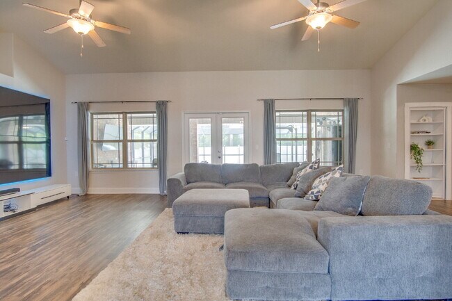 Building Photo - Milton 4BR Pool Home with Office, Vaulted Ceilings, Screened Saltwater Pool & 2-Car Garage