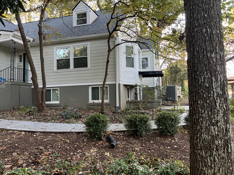 Private, side entrance is under the black veranda on the right. Plenty of natural light. - 3277 N Whitney Ave