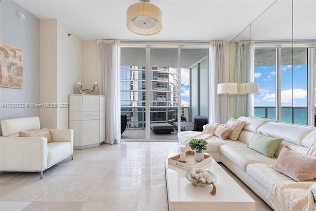 Building Photo - 15811 Collins Ave