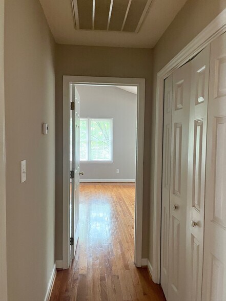 upstairs hallway/linen closet - 8601 Abbotsbury Ct
