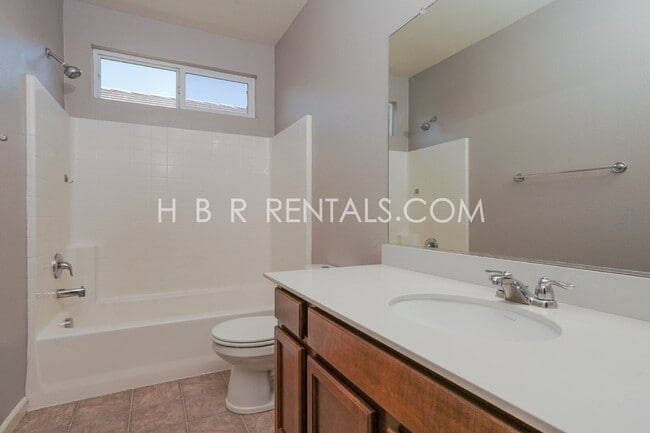 Building Photo - Questa Village: Spacious 3-Bedroom Retreat...