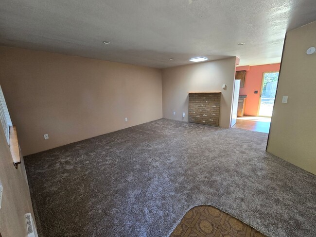 Building Photo - READY NOW. Huge backyard, lovely two bedro...