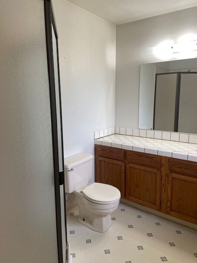Building Photo - Excellent eastside location, 3/2, fenced yard, 2 car garage