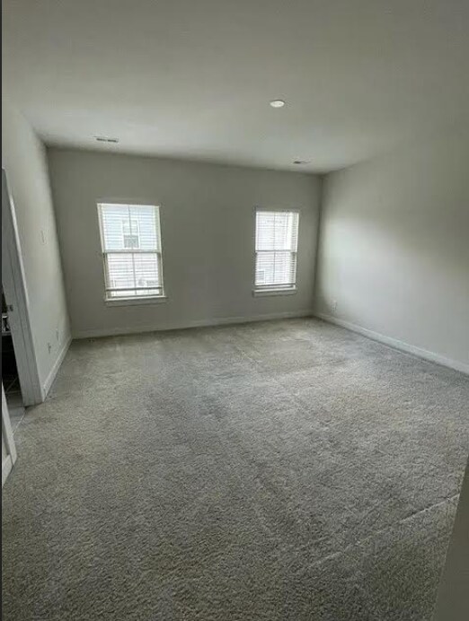 Building Photo - Three story town home with 2 car garage