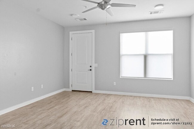 Building Photo - 2 br, 2.5 bath Townhome - 7805 Cooper Lane...