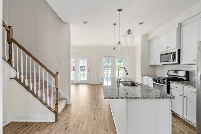 Building Photo - Your Next Home: Modern 3-Level Townhome with Garage, Deck & Huge Flex Space