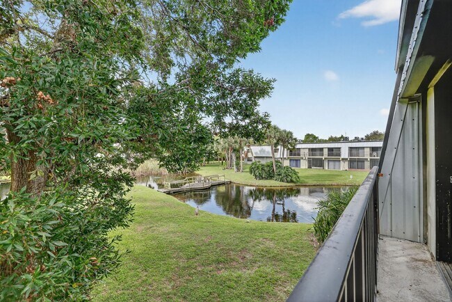 Building Photo - Outstanding one-bedroom, one-bath property with water views and upgrades.