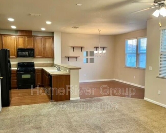 Building Photo - BEAUTIFUL 2/2 NATOMAS!!! Includes w/s/g!!!...