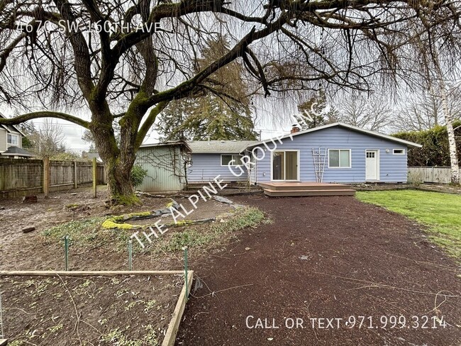 Building Photo - Single-level home, hardwoods, deck!