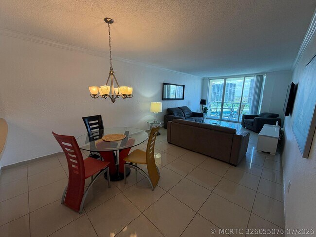 Building Photo - 19390 Collins Ave