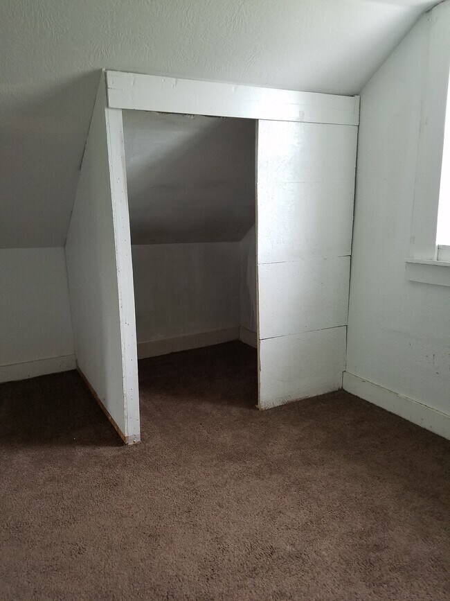 Upstairs Bedroom #2, west wall with closet. - 15 Goodrich St
