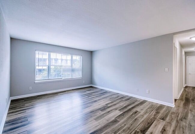 Building Photo - Spacious 2-Bedroom Elite Apartment with Private Balconies & Washer/Dryer