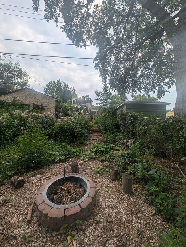 Building Photo - Charming Garden Oasis in West St. Paul – Fire Pit, Pond & Prime Location!