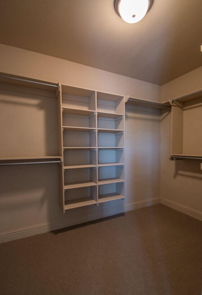 Building Photo - Luxurious Executive Row House in Northeast Fayetteville! Lawn care included!