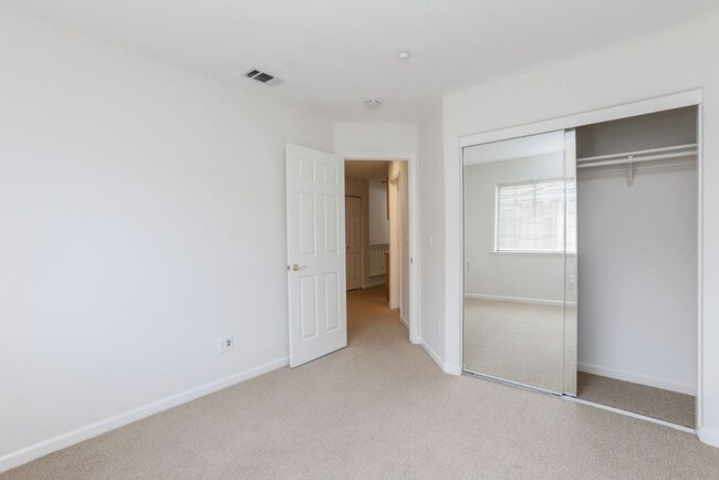 Building Photo - 3 Bed / 2.5 bath, three-level townhome with a bonus home office/den + EV charger in garage. YouTu...