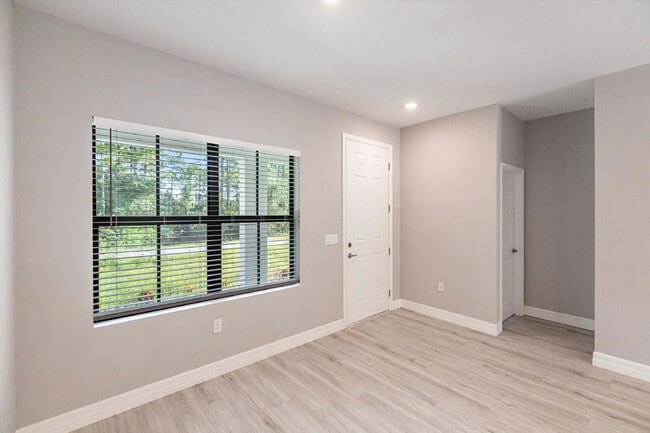 Building Photo - Brand New 4-Bedroom Gem with 2 Full Baths on Large Lot in Lehigh Acres – A Perfect Family Haven!