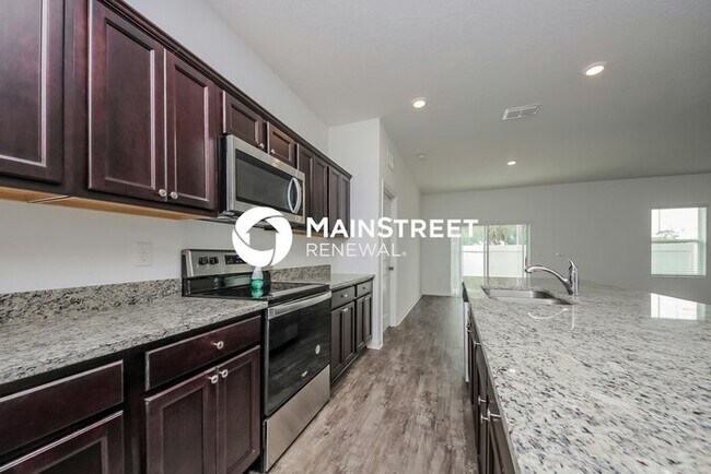 Building Photo - 4 Bedroom Pet-Friendly Home in Haines City, FL with Main Street Renewal