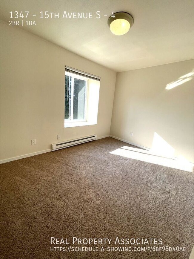 Building Photo - Bright Large Corner Unit Apt - *GARAGE PAR...