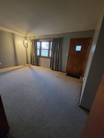 Living room from kitchen - 104 S Park St