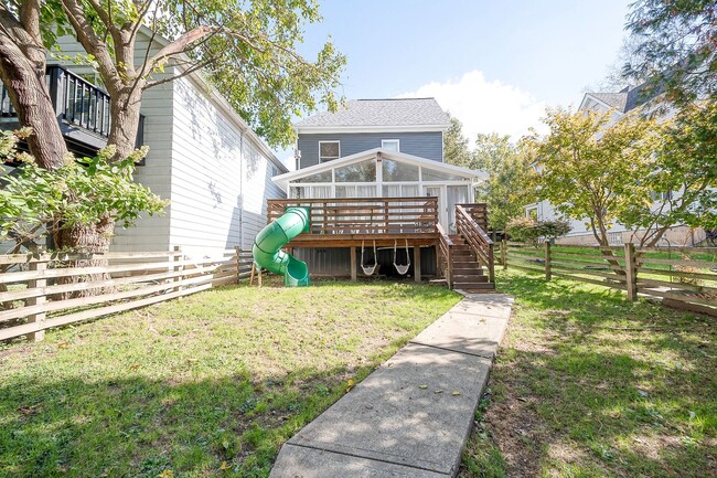 Building Photo - This renovated family friendly home will e...