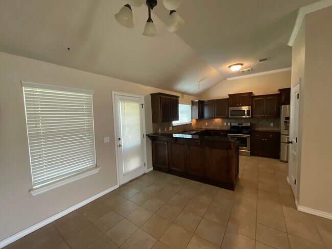 Building Photo - 4 bed, 2 bath, 2 car garage, 12-14 person Storm Shelter