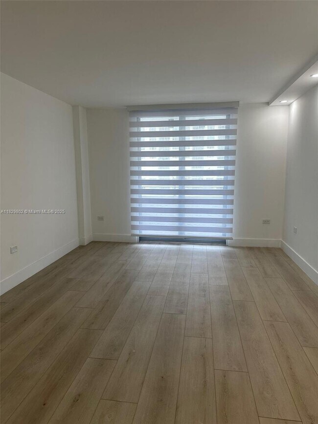 Building Photo - 5555 Collins Ave